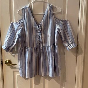 Open shoulder lace-up top.